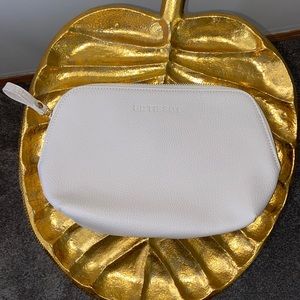 Tissot makeup bag. New. Off white